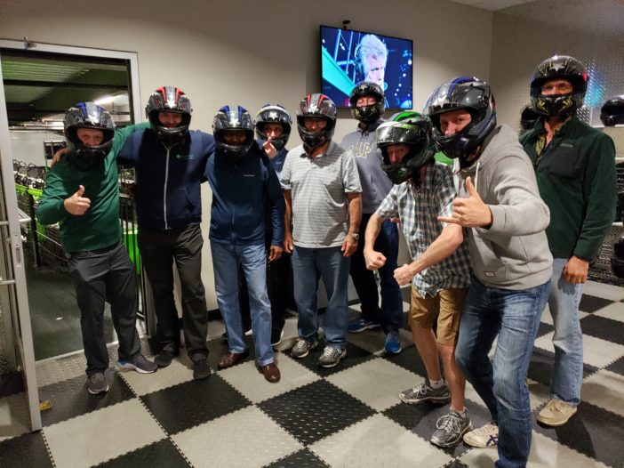 Trader Transformation Workshop with helmets at Andretti